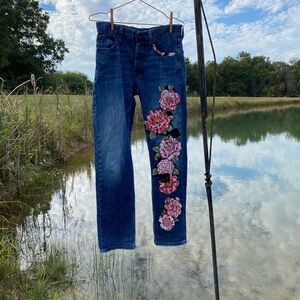 Jeans upcycled pink and red floral motif crochet and embroidered embellishment
